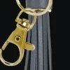 Reflex tassel guldgrå